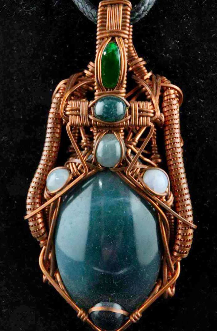 Jadeite cabochon pendant in hand-wrapped copper
